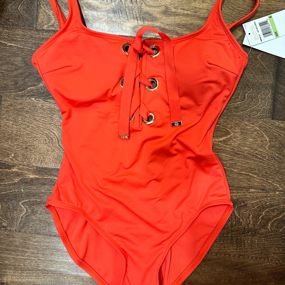 Brand new, never used coral/red Michael Kors one piece size 8 women’s